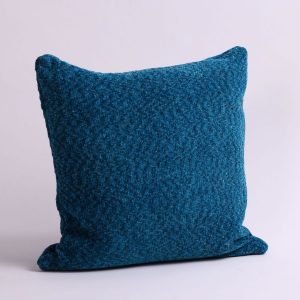 blue yarn pillow