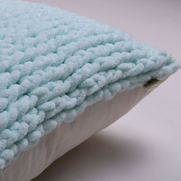 mint knitted pillow