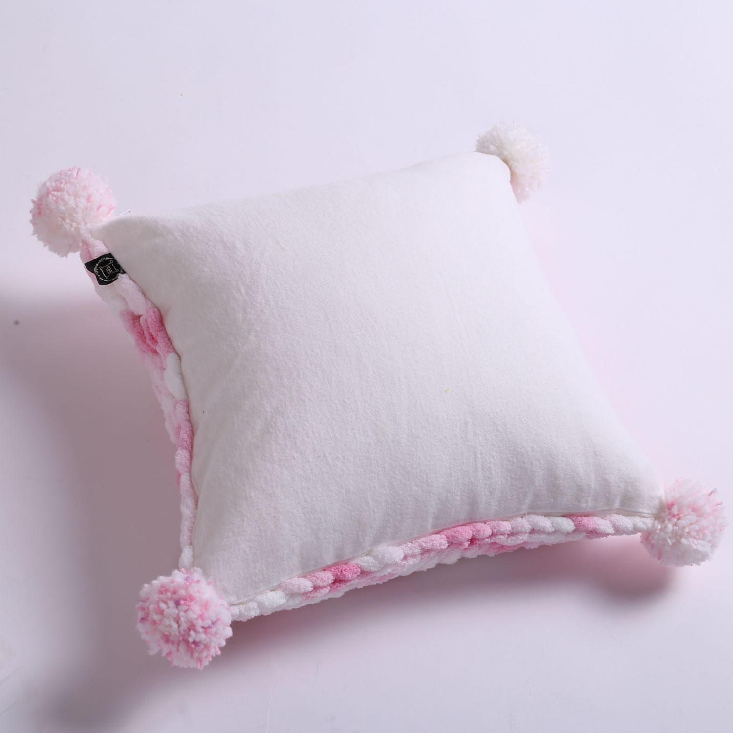 Pink plush pillow with pom poms – Cozy With Grandma