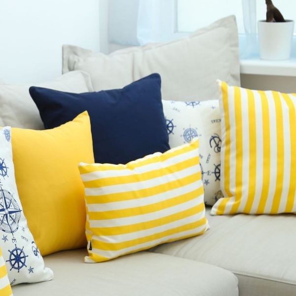 Yellow and white stripes pillow