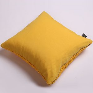 Textured soft yarn pillow