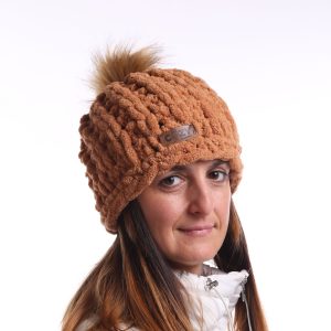 brown knit hat with pom pom