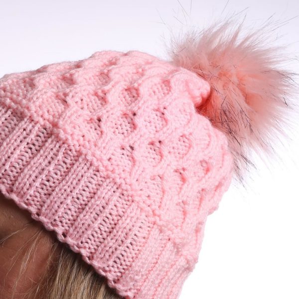 pink hat with pom pom