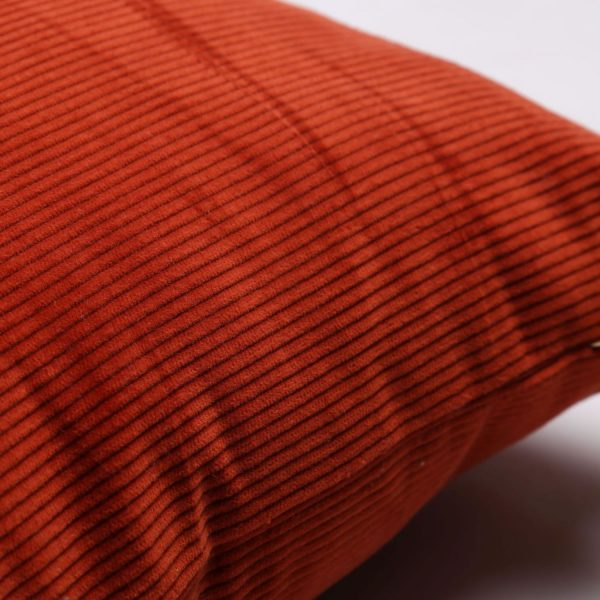 textured orange cushion